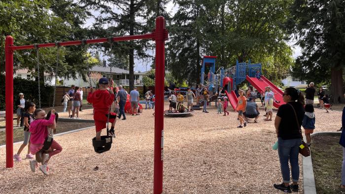 Children playing in playground.