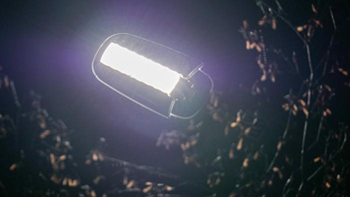 Lit up LED streetlight.