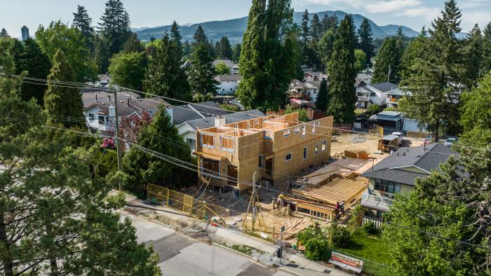 House under construction in a neighbourhood