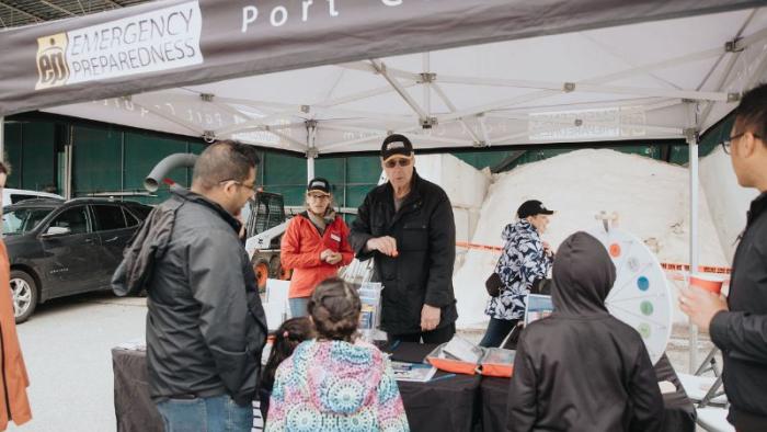 People at an emergency preparedness educational booth
