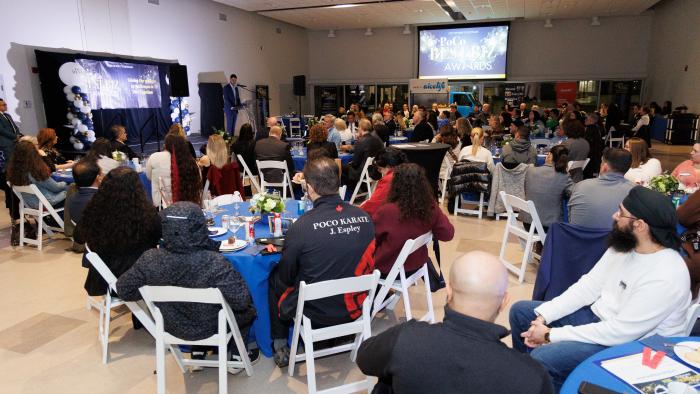 Audience sitting at tables at Best Biz Awards presentation