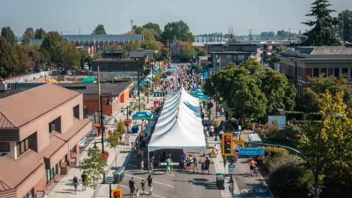 Aerial image of a street festival on McAllister Avenue
