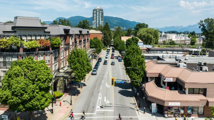 Aerial photo of Shaughnessy St in downtown Port Coquitlam, with street, crosswalks, trees and businesses