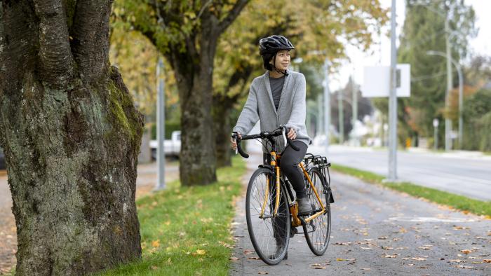 Cyclist on multi-use pathway on Prairie Avenue