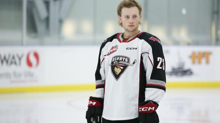whl hockey player on ice at port coquitlam community centre