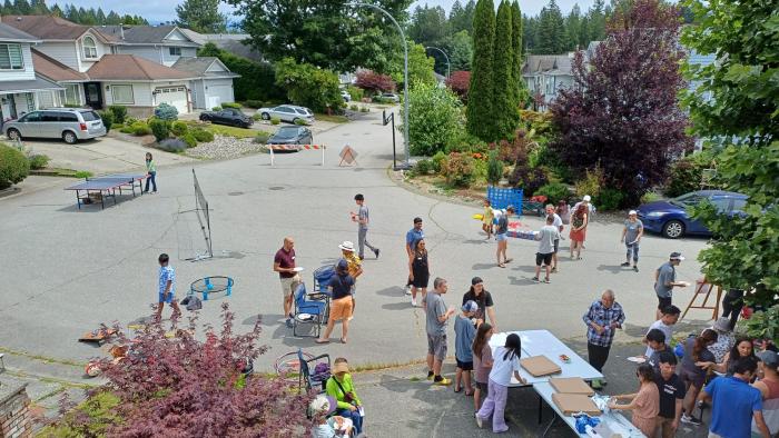 people on street having a block party