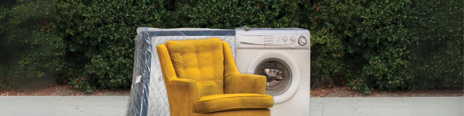 Couch, washing machine, and mattress at the curb
