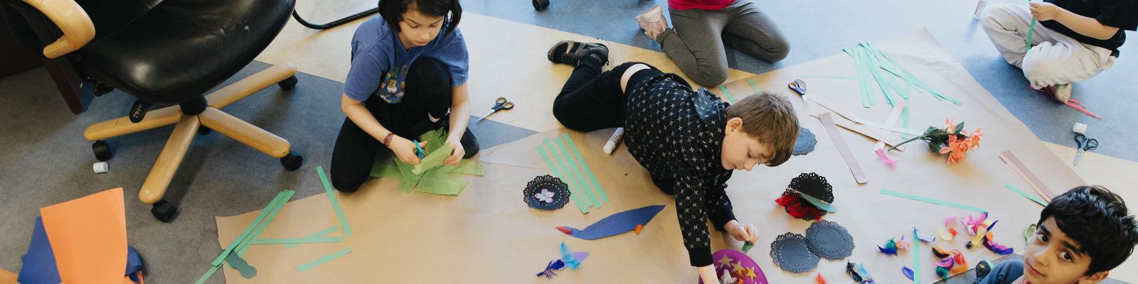 Kids working on a craft