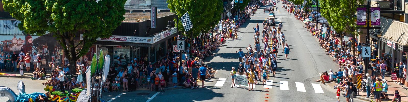 Aerial image of people watching May Day Parade in downtown Port Coquitlam
