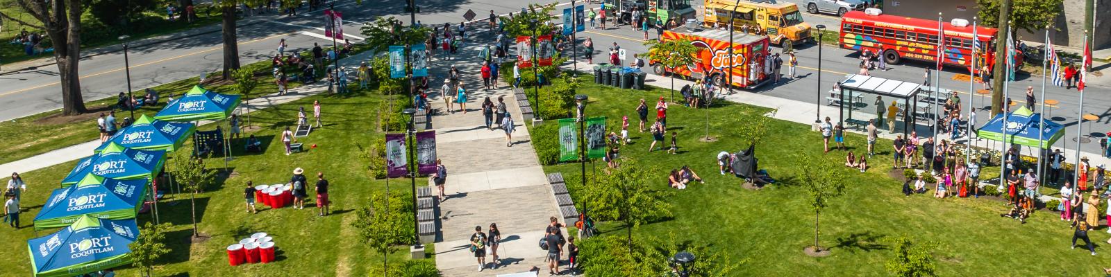 Aerial image of recreation centre during Party in the Square with lots of people exploring activities