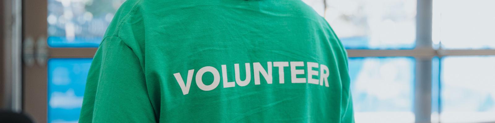 Person wearing a Volunteer t-shirt