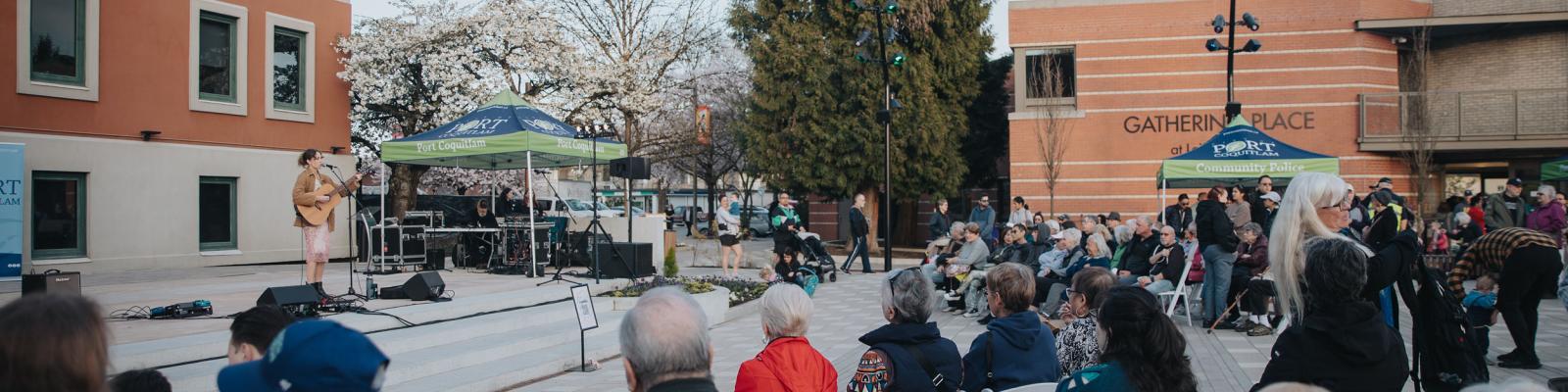 Crowd watching music performance at Leigh Square