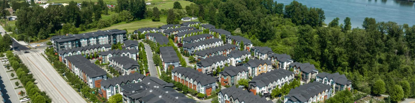 Aerial view of houses by the river