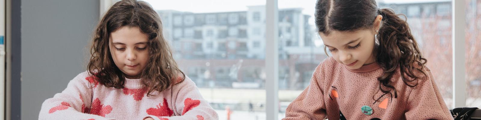 kids working on art at a table