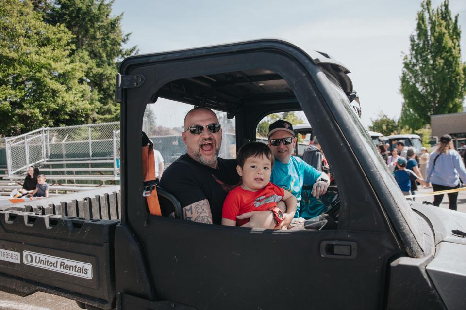 Family on buggy ride at Public Works Open House