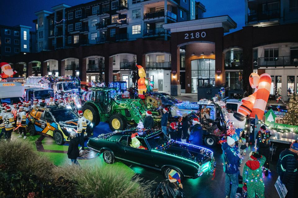 christmas parade vehicles at start