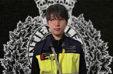 A photo of a man wearing emergency responder gear