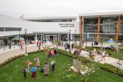 Outside of Port Coquitlam Community Centre with people walking around