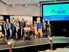 Winners of volunteer awards on stage