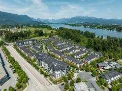 Aerial view of houses by the river
