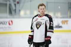 whl hockey player on ice at port coquitlam community centre