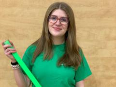 photo of girl wearing volunteer shirt