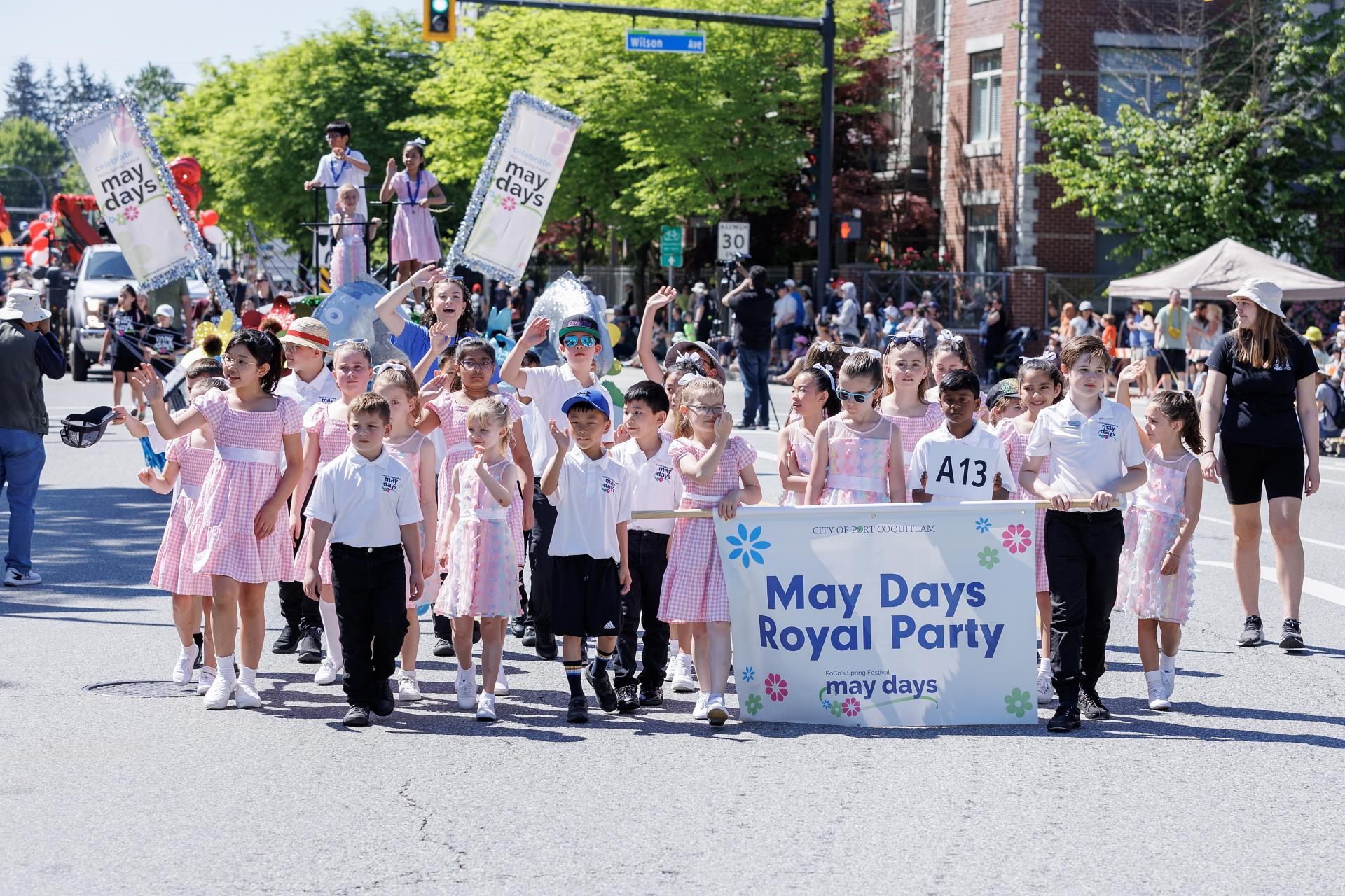 May Days Royal Party walking in the parade in downtown Port Coquitlam