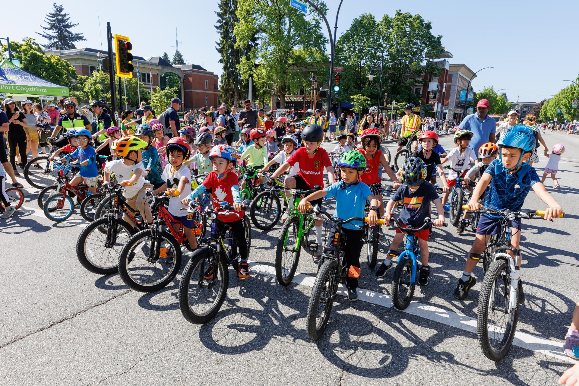 Kids on bikes in front of City Hall