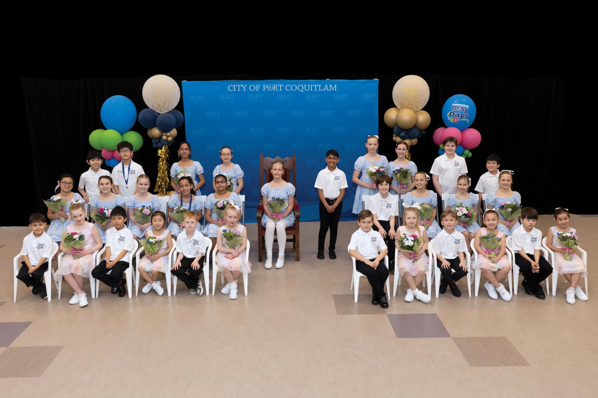 Group of children participating in May Days Royal Party