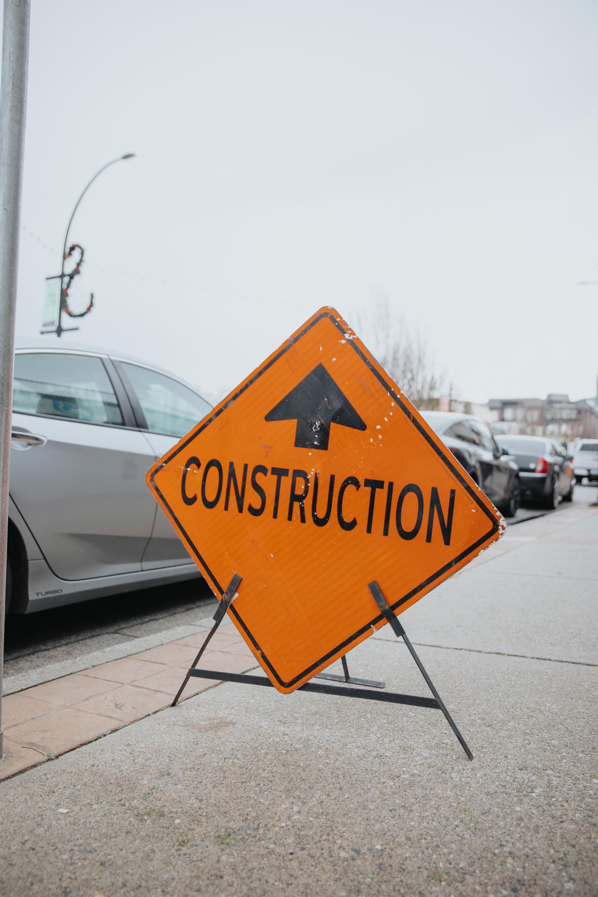 Construction sign on sidewalk