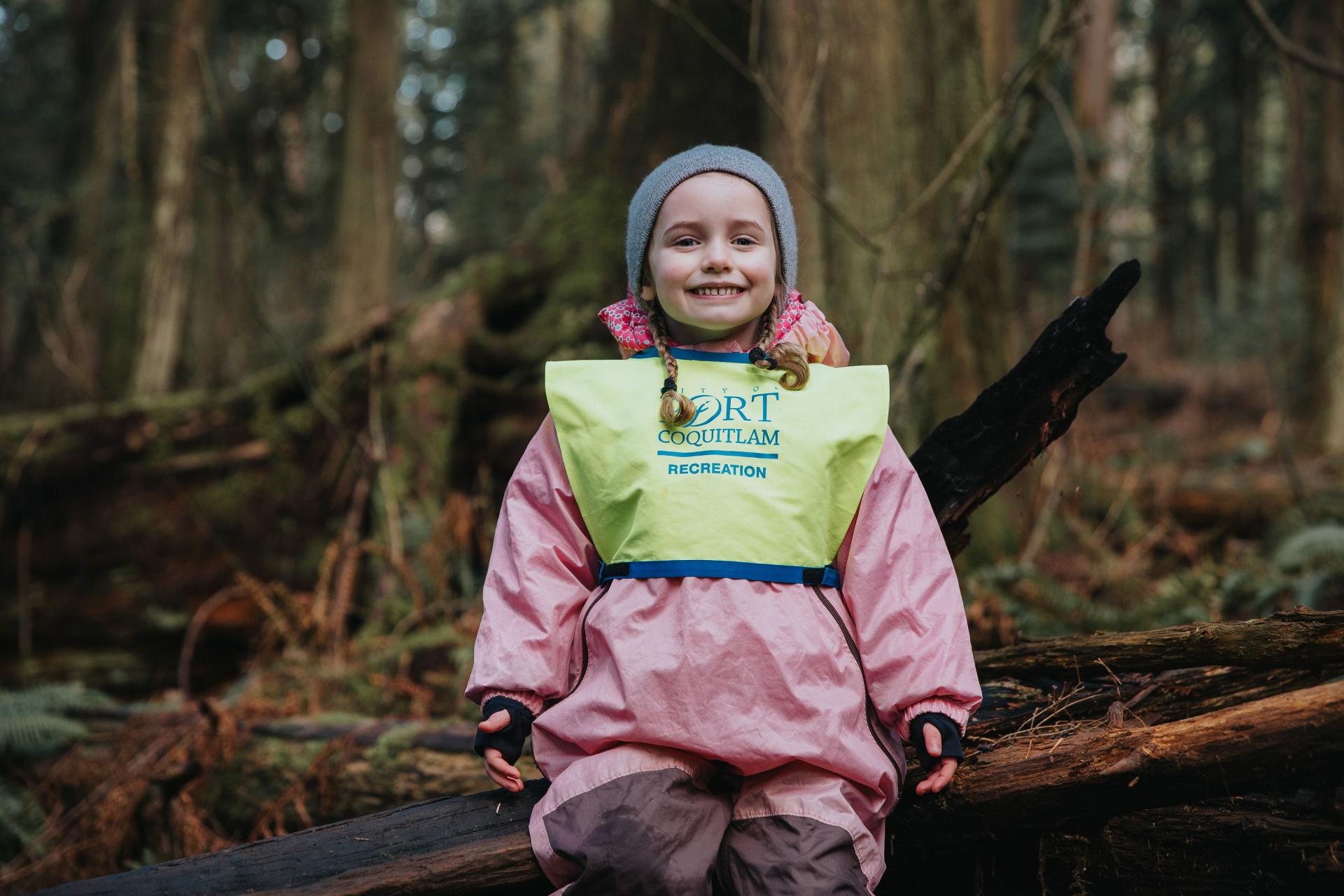 girl in forest participating in outdoor recreation camp